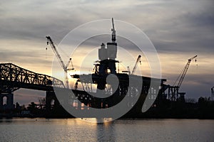 Bridge construction at sunset