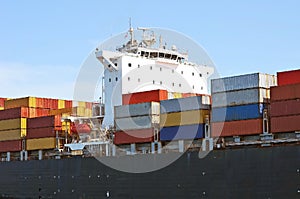Bridge of a Container Ship and on Deck Containers
