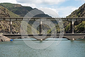Bridge in the course of river Rio Sil in Galicia photo