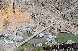 Bridge crossing the river on bottom of Colca Canyon - Aerial Perspective