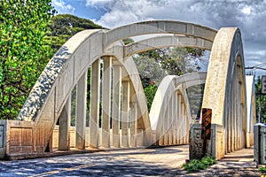 Bridge crossing waterway in Oahu, Haleiwa, Hawaii on a winter day photo