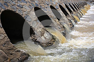 Bridge, dam, flowing streams water. Flooding during rainy season