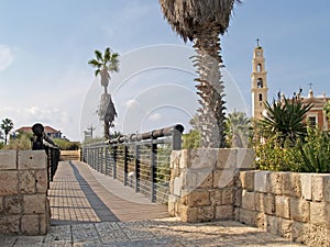 Bridge of desires and view of Catholic church. Yaffo, Israel photo