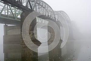 Bridge disappears in the fog photo