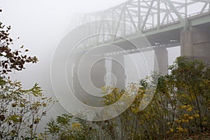 Bridge disappears in the fog photo