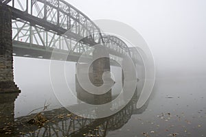 Bridge disappears in the fog photo