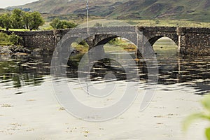 Bridge of Eilan Donan Castle fortified castle built in the mid 1