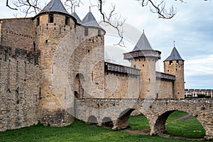 Bridge and entrance of the citadel of the CitÃ© de Carcassonne, fortified city of Carcassonne, Aude, Occitanie region, France.