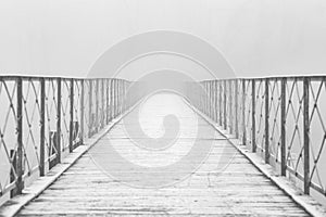 Bridge Fading Out In The White Fog