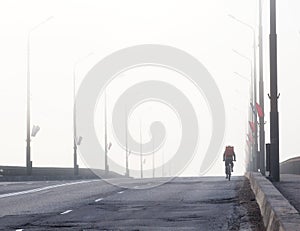 The bridge in the fog across the Volkhov River in Veliky Novgorod