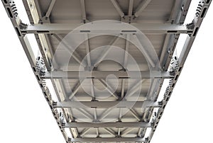 Bridge frame with bolted painted metal beams.