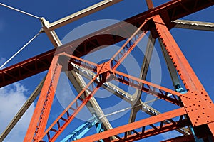 Bridge frame steel girders painted bright colours