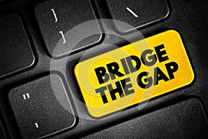 Bridge The Gap - connect two things or to make the difference between them smaller, text concept button on keyboard