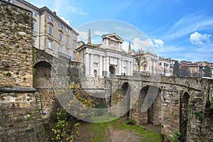 Bridge and the gate Porta San Giacomo in Bergamo, Italy