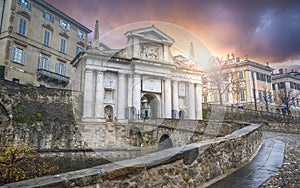 Bridge and the gate Porta San Giacomo in Bergamo, Italy