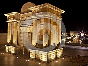 Bridge Gate (Puerta del Puente) triumphal Renaissance arch illuminated at night in Cordoba, Andalusia