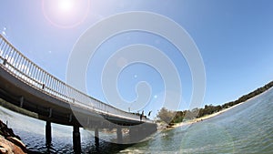 Bridge jumping. Summer fun at Lake Cathie NSW Australia