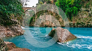 The bridge is known as `Bugrum or Oluk` bridge. Koprucay river landscape from Koprulu Canyon National Park in Manavgat, Antalya.