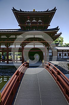 Bridge leading to Byodo-in temple in Uji, Japan