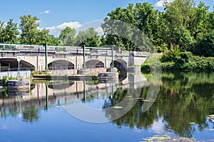 bridge and lock over yonne river at escolives saint camille photo