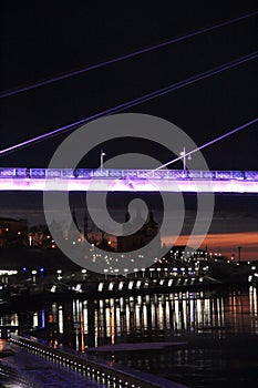 Bridge of lovers on the background of the monastery, Tyumen