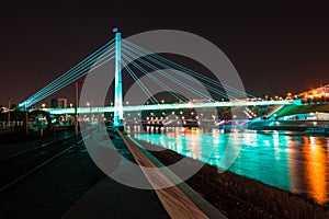 Bridge of Lovers and Tura River in Tyumen, Russia