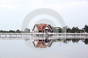 The bridge in the middle of the pond on the pavilion