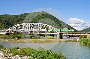 Bridge through mountain river