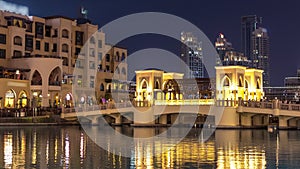 The bridge near the biggest musical fountain in Dubai day to night timelapse. Dubai, UAE