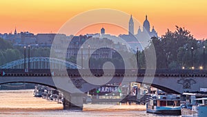 Bridge near Eiffel tower and the Seine river night to day transition timelapse before sunrise, Paris, France.