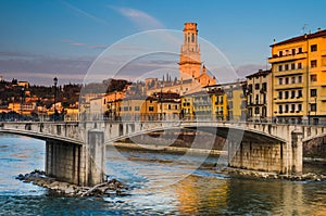 Bridge over Adige river in Verona, Duomo tower photo