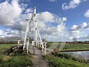 A bridge over a canal in a nature reserve around Wolvega