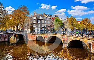 Bridge over channel in Amsterdam Netherlands houses river Amstel