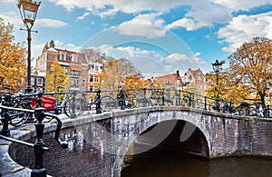 Bridge over channel in Amsterdam Netherlands houses river Amstel