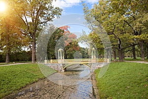 The bridge over the channel overgrown with a duckweed. Catherine Park. Pushkin Tsarskoye Selo. Petersburg