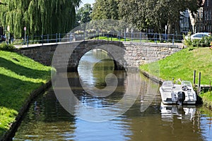 Bridge over a gracht in Friedrichstadt, the beautiful town in northern Germany founded by Dutch settlers photo