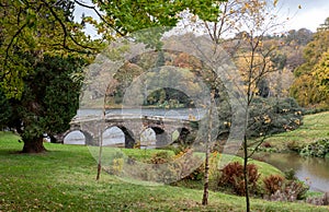 The bridge over the lake at Stourhead National Trust property near Warminster in Wiltshire UK