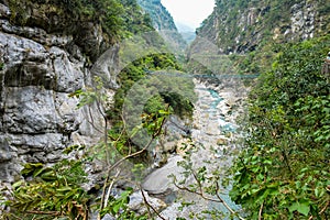 Bridge over the Liwu River Gorge surrounded by green mountain of Taroko Gorge in Taroko National Park, Taiwan