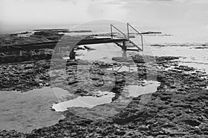 bridge over looking the ocean waves