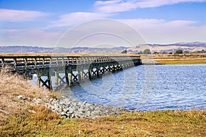 Bridge over the marshes of East San Francisco Bay, Hayward, California photo