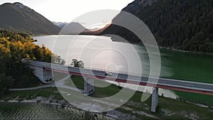 Bridge over mountain lake reservoir, Sylvenstein, Bavaria, Germany