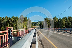 Bridge over a mountain river Katun