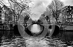 A bridge over one of the canals in Amsterdam centrum photo