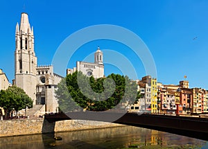 Bridge over Onyar and Collegiate Church with Gothic Cathedral