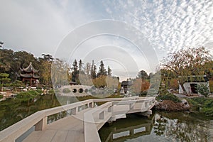 BRIDGE OVER POND AT HUNTINGTON LIBRARY IN SOUTHERN CALIFORNIA UNITED STATES