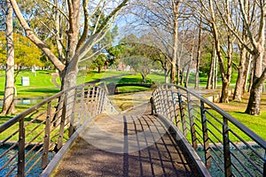Bridge over the pond at Rymill Park  in Adelaide city during winter season