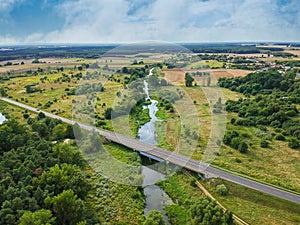 Bridge over river Barycz in Osetno, Poland.