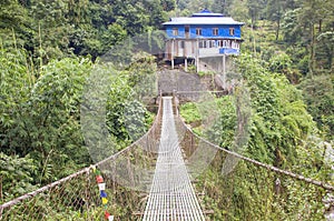 Bridge over the river beautiful tropical landscape of Mount Nepal Himalayas