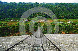 Bridge over the river in Nepal. River Bridge.