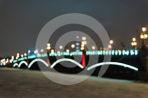 The bridge over the river at night